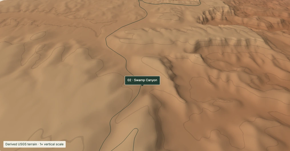Derived terrain setting of Swamp Canyon, with mapped roads; elevation and shading colors are illustrative.