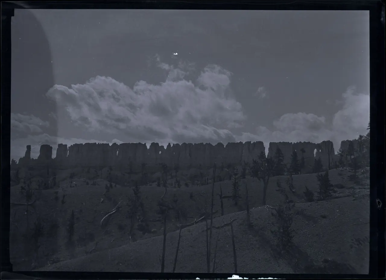 Archival black-and-white photograph of China Wall, a long narrow ridge of rock, seen from the Fairyland Loop.
